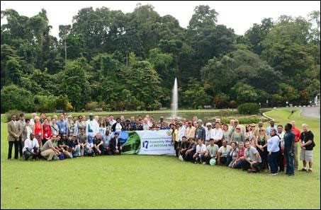 The delegates took a picture on the environmental excursion in Bogor Botanical Garden.